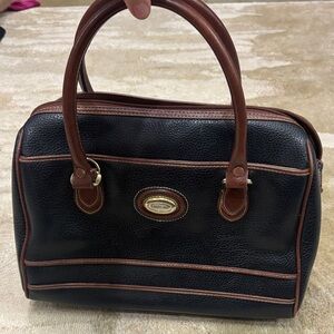 Carryland: Elegant Black and Brown Handbag